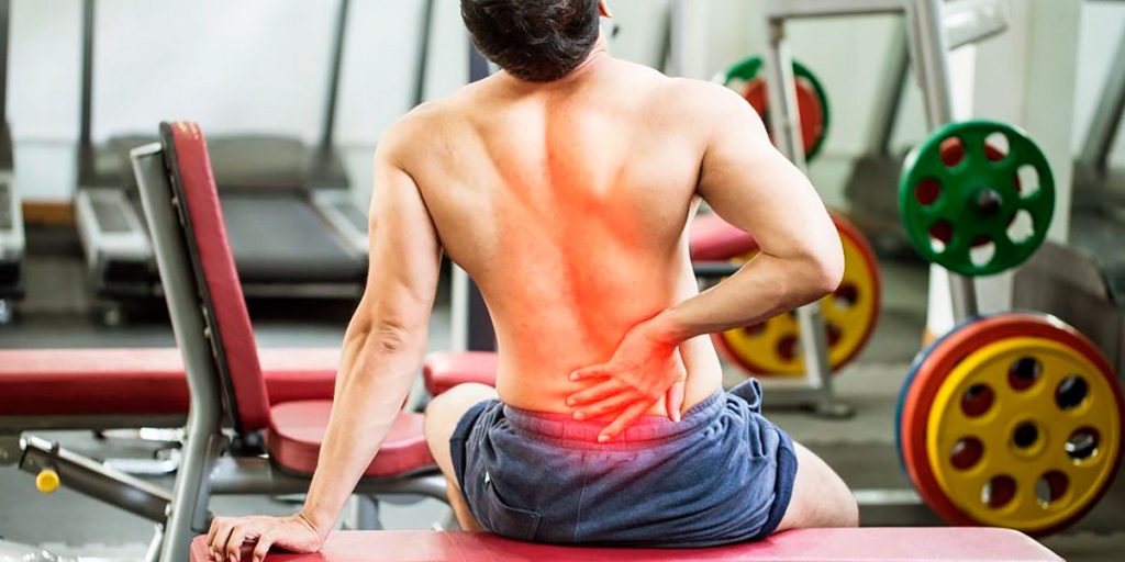 causas dolor espalda entrenamiento